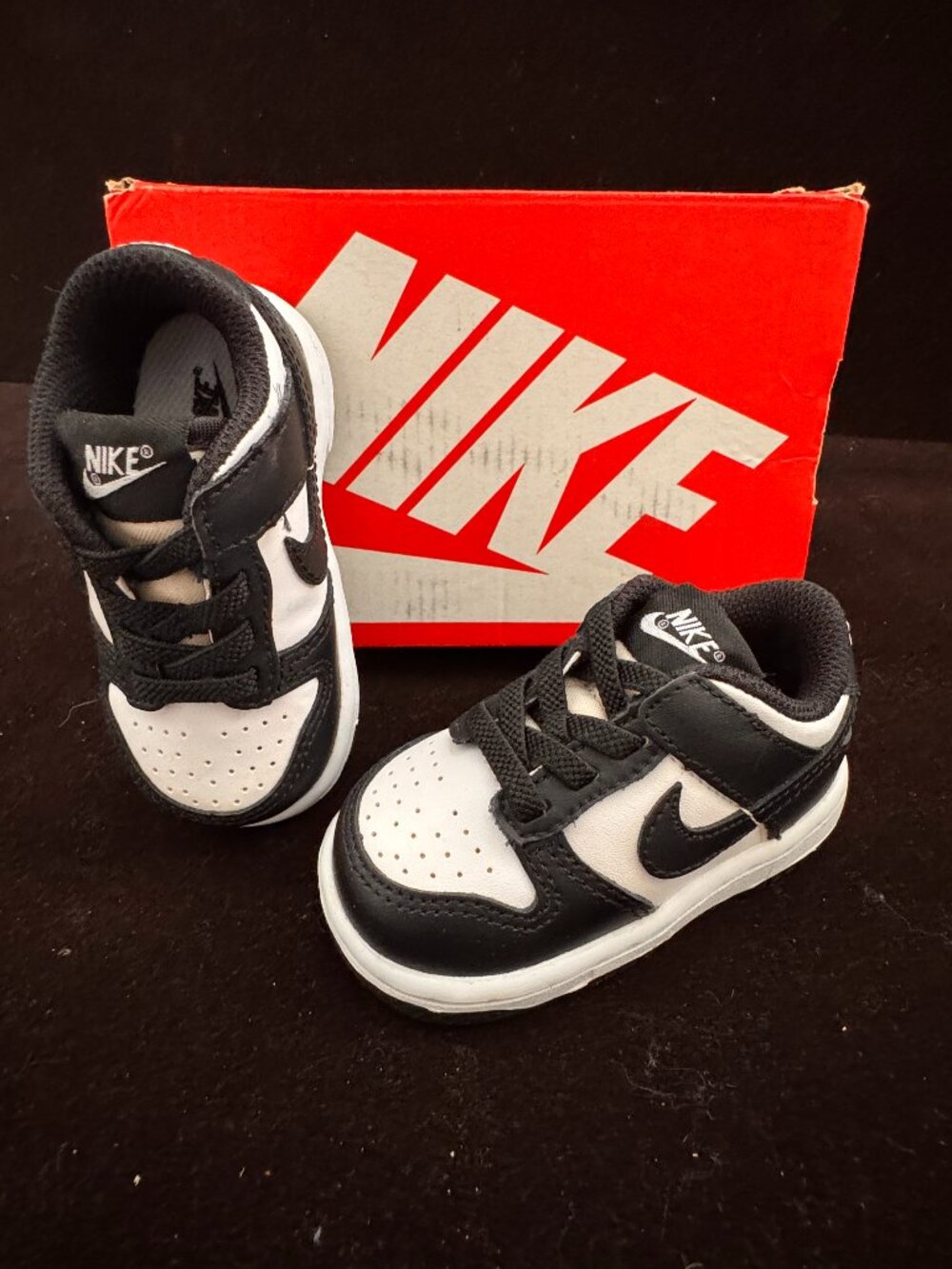 Nike Dunk Low "Panda" (Black/White) shoes in size 4C